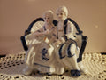 Porcelain Figurine of a Couple in 18th Century attire