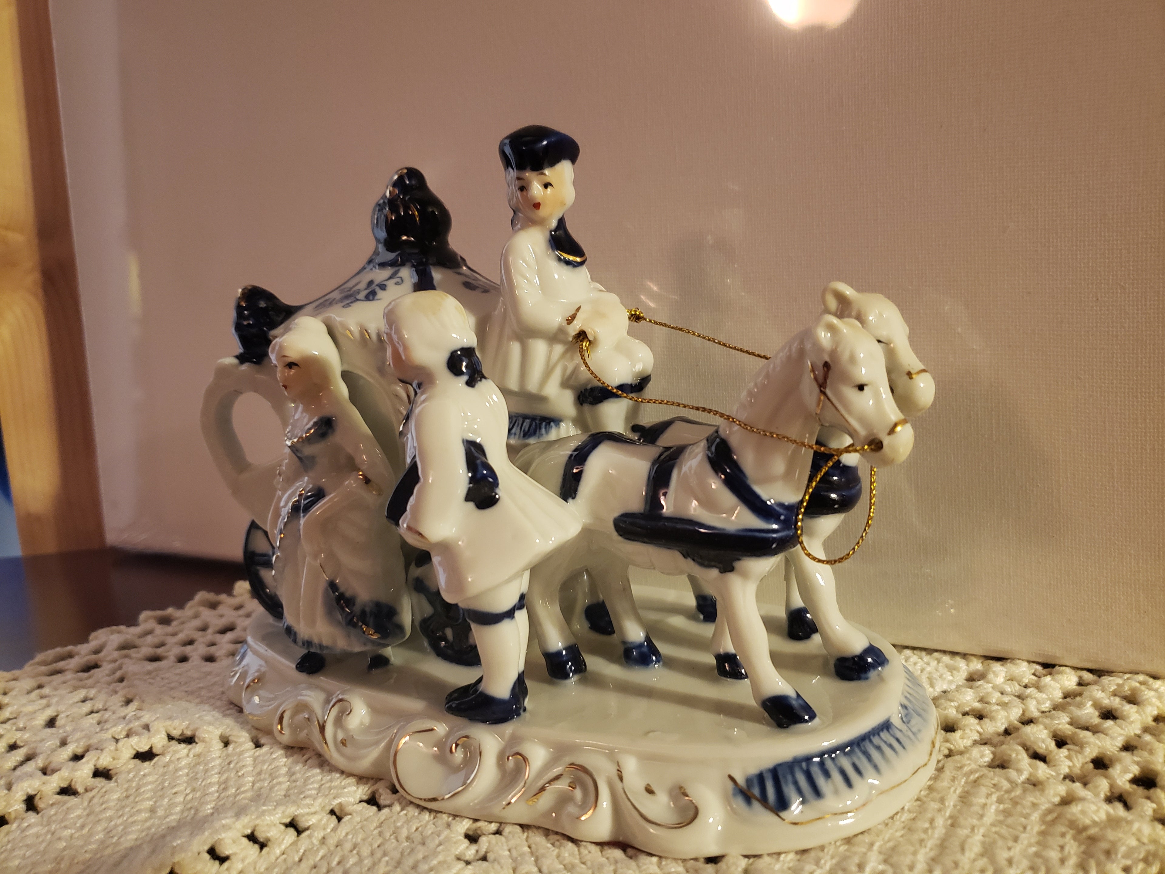 Porcelain Horse-Drawn Carriage Figurine